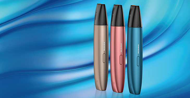 Three VEEV vaping devices in different colours on a wavy background