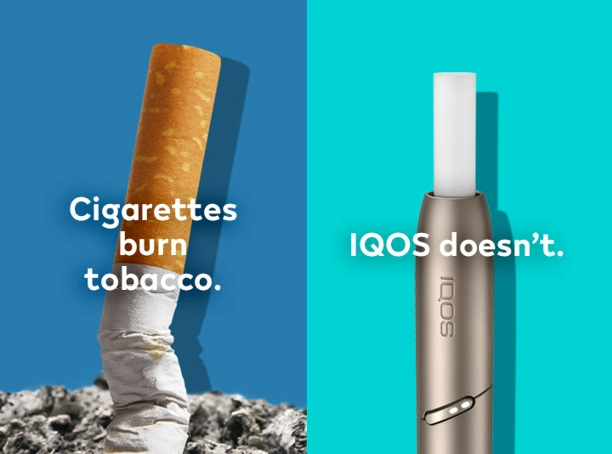 cigarette butted out in a pile of ash on a blue background, silver IQOS device with heatstick on a turquoise background