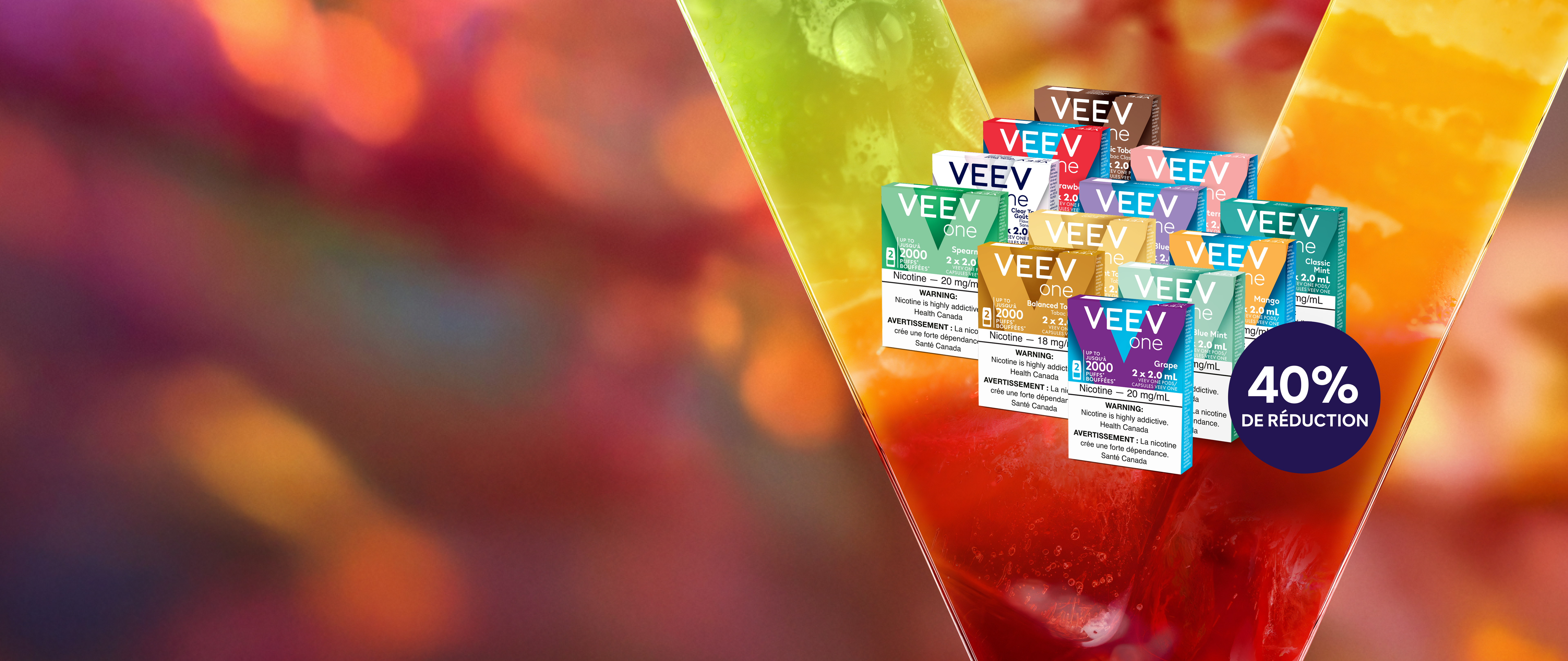 
12 paquets de capsules VEEV ONE avec un autocollant rond « 40 % de réduction » sur un fond en V de couleur vive.