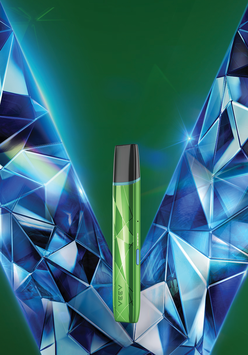  VEEV ONE Special Edition Device in a green backrgound. Green, sleek finish with a laser engraved design.