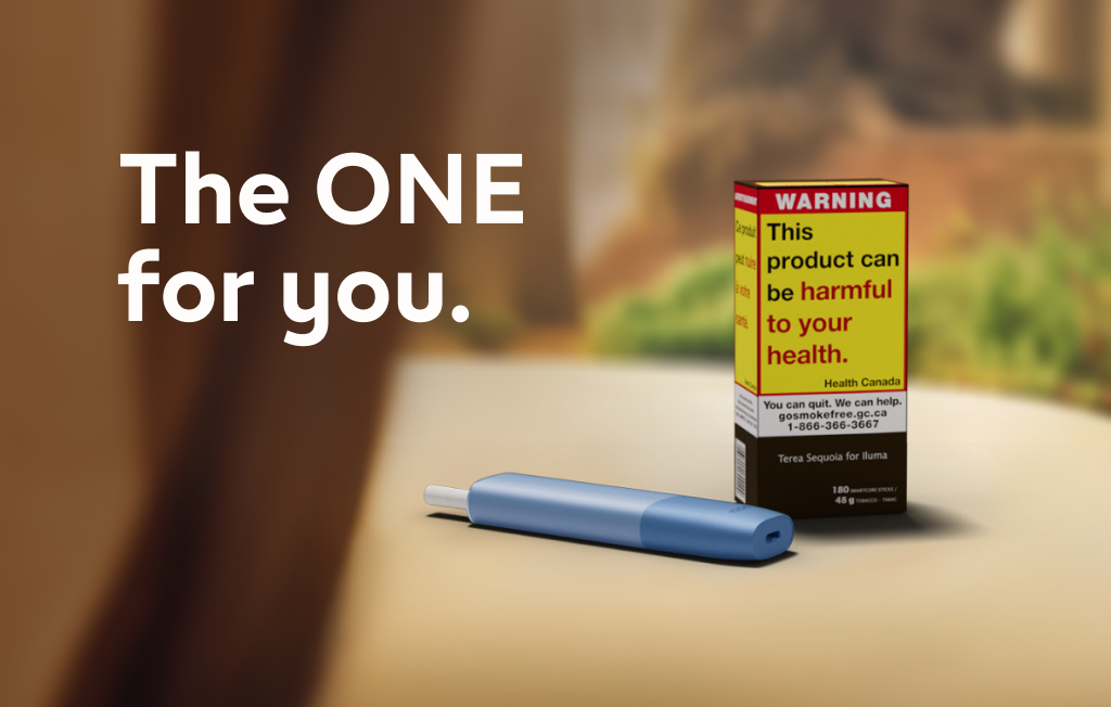 NBI - Meet The ONE - An IQOS ILUMA ONE with a TEREA stick inside next to a carton of TEREA 180s on a table.