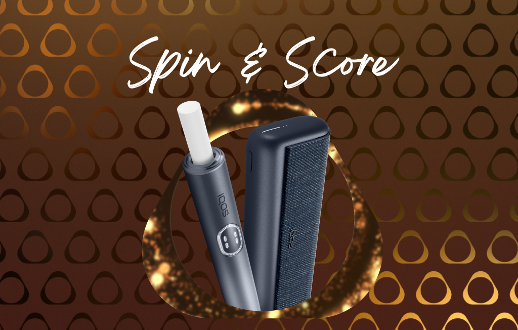 A Midnight Black IQOS ILUMA i PRIME device with a TEREA stick inserted within a golden IQOS key on a gold background alongside the IQOS logo.” tag.