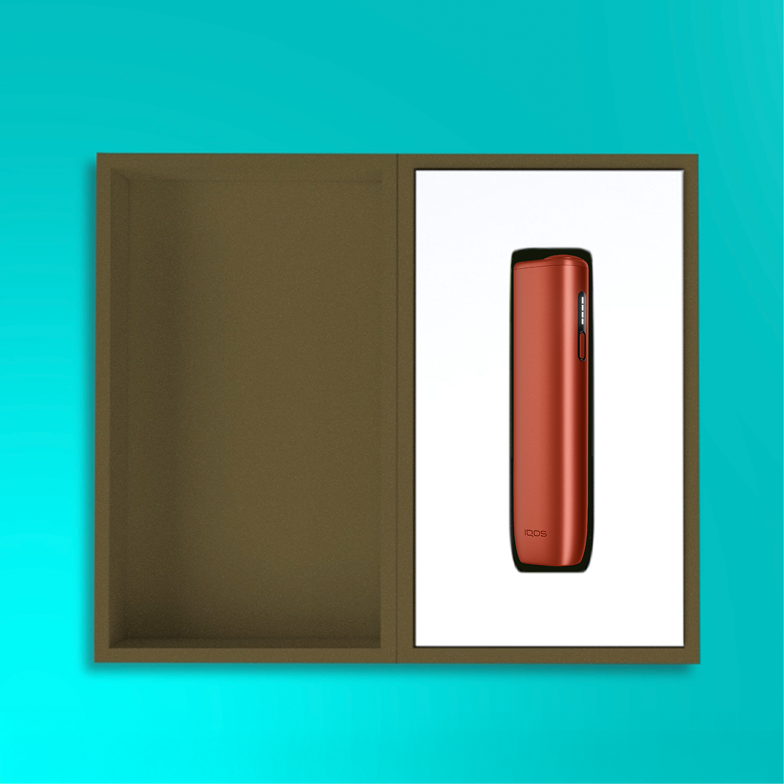 An IQOS ILUMA i ONE in a box. 