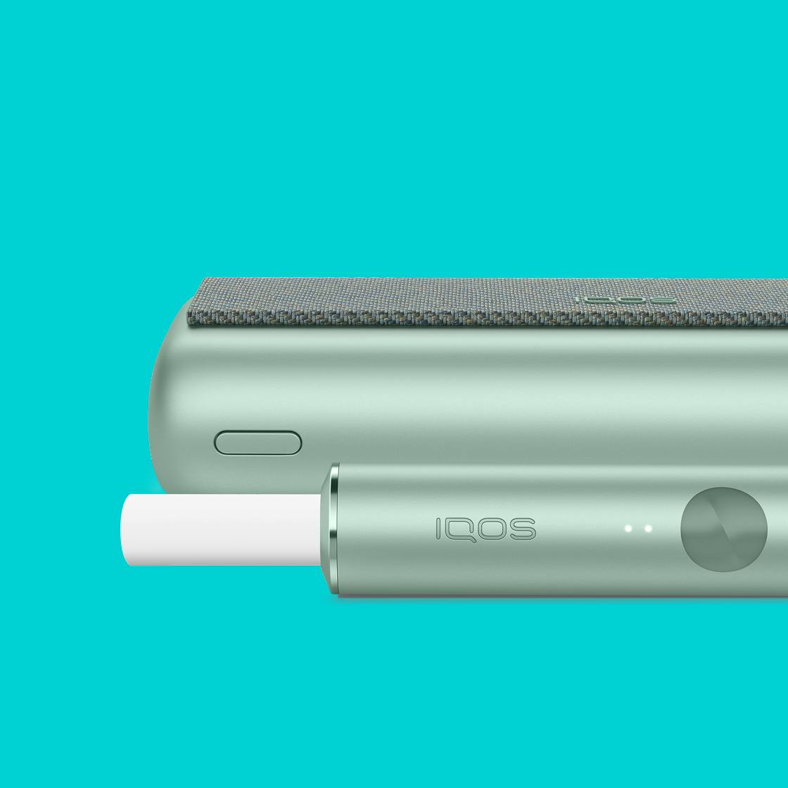 A jade green IQOS ILUMA PRIME Pocket Charger and Holder.