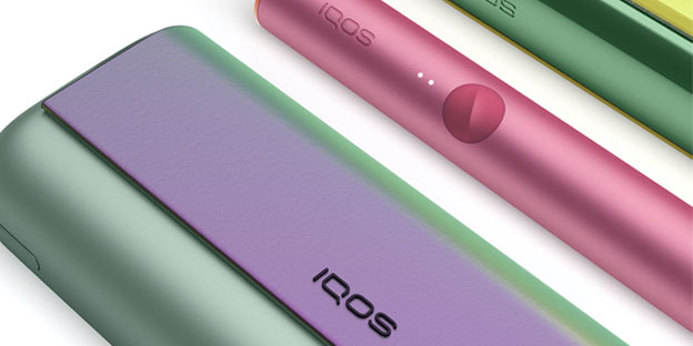 A close-up image of an IQOS ILUMA Holder and Charger. 
