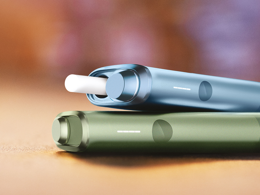Une image en gros plan d’un support et d’un chargeur IQOS ILUMA.