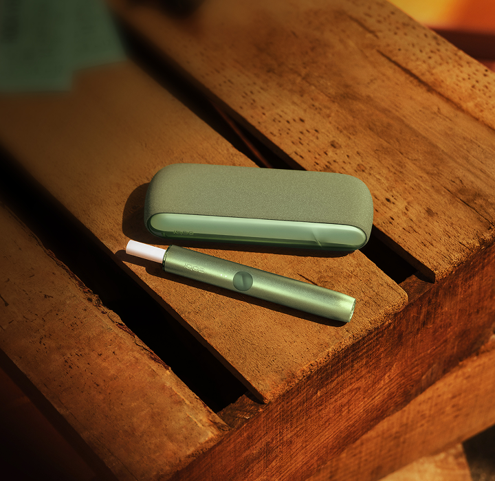 An IQOS ILUMA PRIME Pocket Charger and Holder.