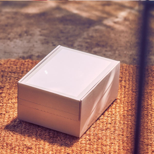 An IQOS box on the floor.