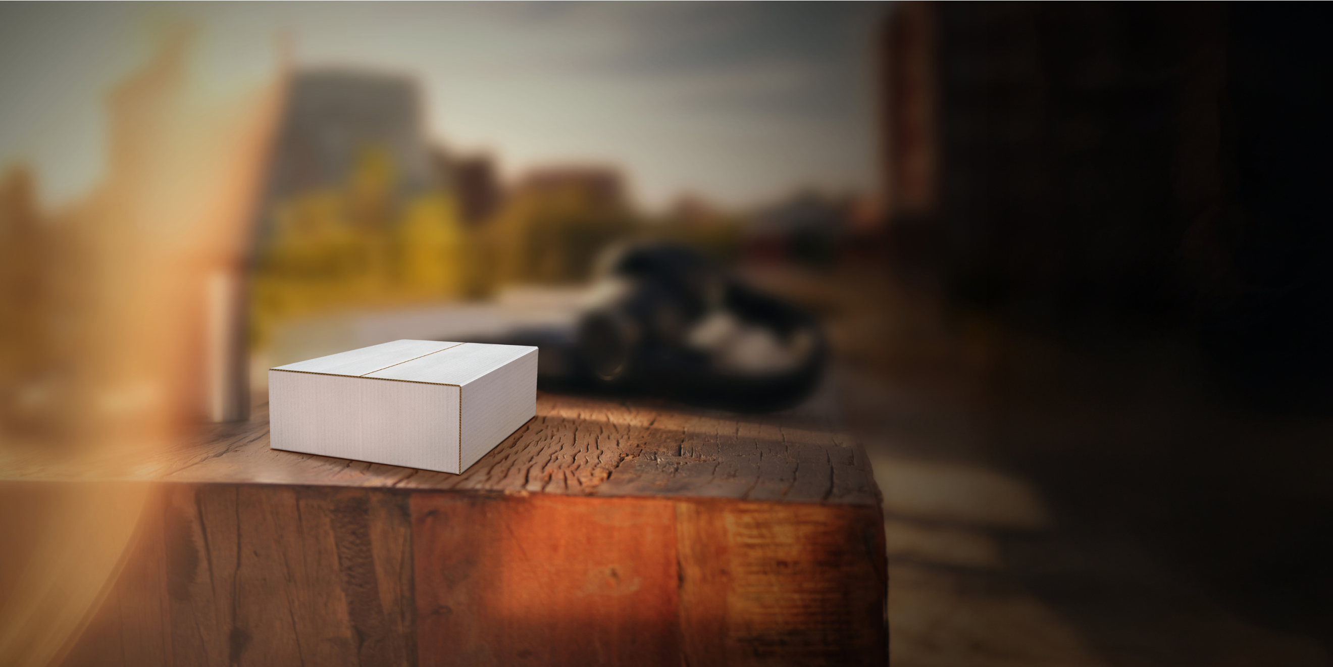 A delivery box on a wood block.