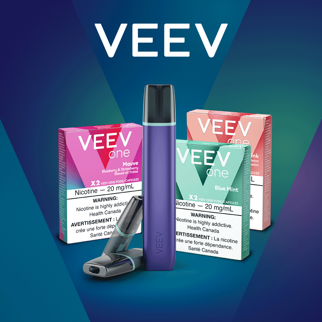 A VEEV ONE device with 3 packs of pods.