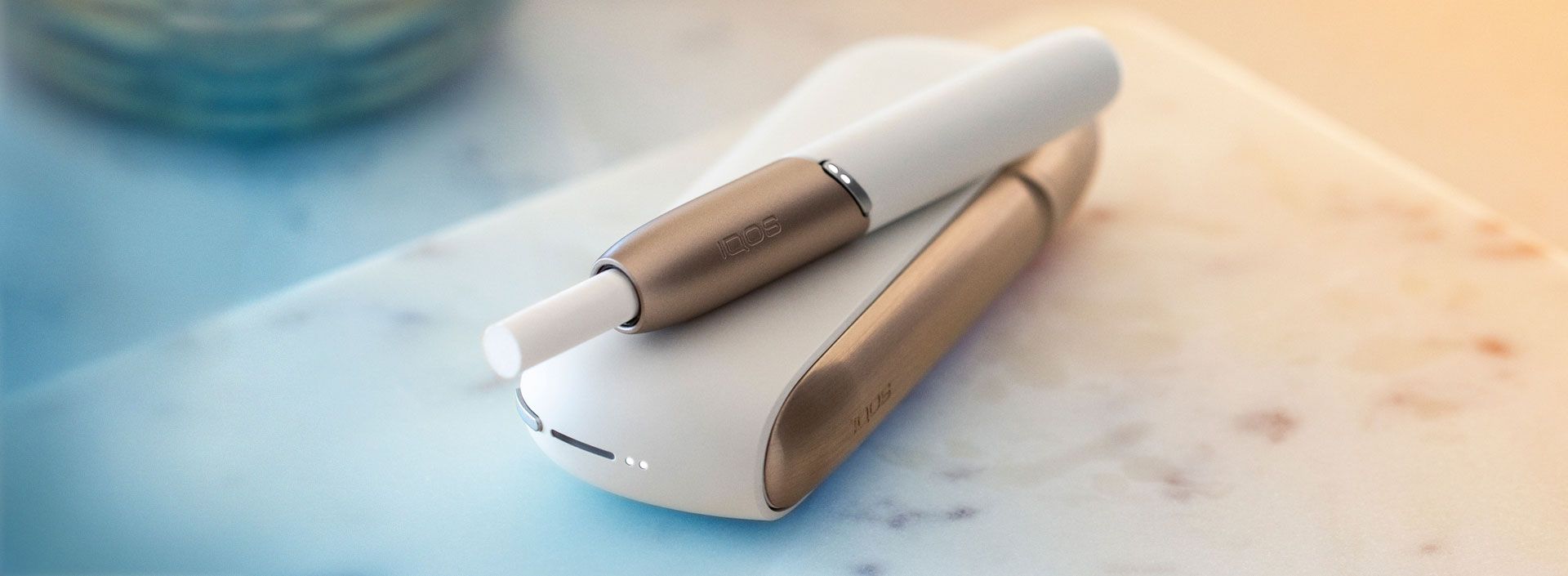 IQOS 3 DUO in warm white and Brilliant Gold