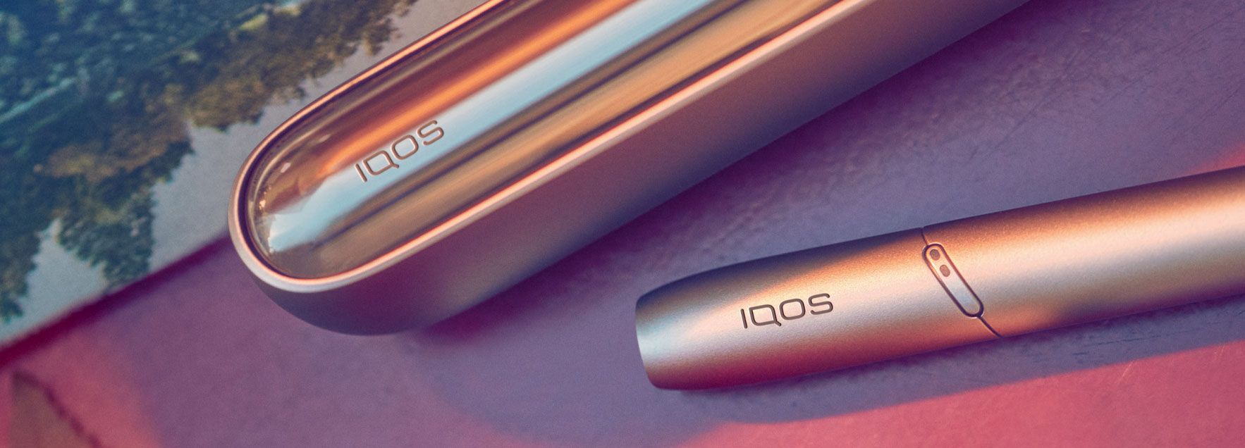 IQOS device in the car